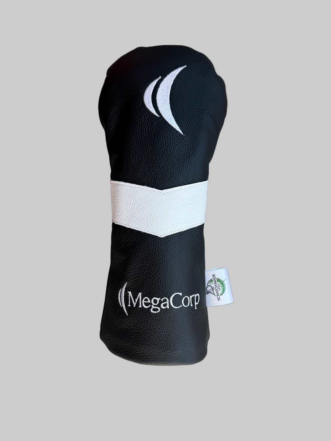 Black golf club head cover with white accents and 'MegaCorp' branding on a gray background