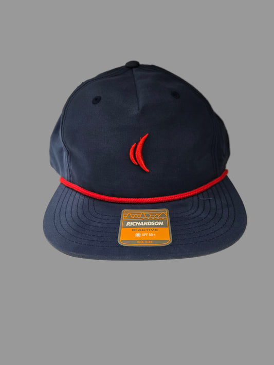 Navy blue cap with red brim and visible brand logo on a neutral background